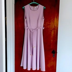 Beautiful and simple dress in A shape. Color: soft lilac